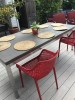 Customer Photo #1 submitted by D. F. from Key West, FL - Air XL Outdoor Dining Arm Chair Red