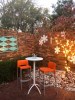 Customer Photo #1 submitted by J. T. from Tulsa, OK - Gio Resin Outdoor Barstool Orange